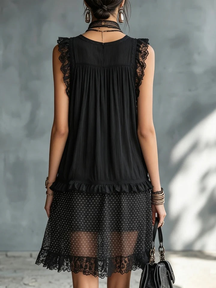 Mini vestido negro con lunares de Valmont Gallery