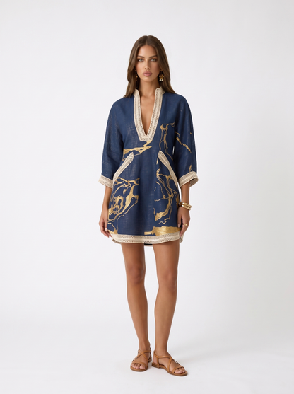 Mini vestido azul marino con toques dorados de Valmont Gallery