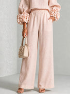 Ofelia | Combinado con puños florales y pantalones de pierna ancha.