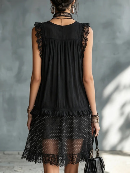 Mini vestido negro con lunares de Valmont Gallery