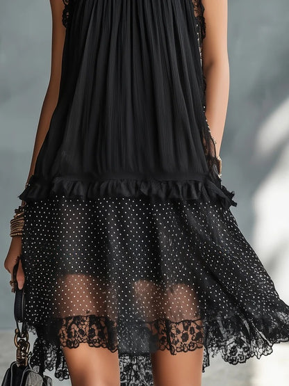 Mini vestido negro con lunares de Valmont Gallery